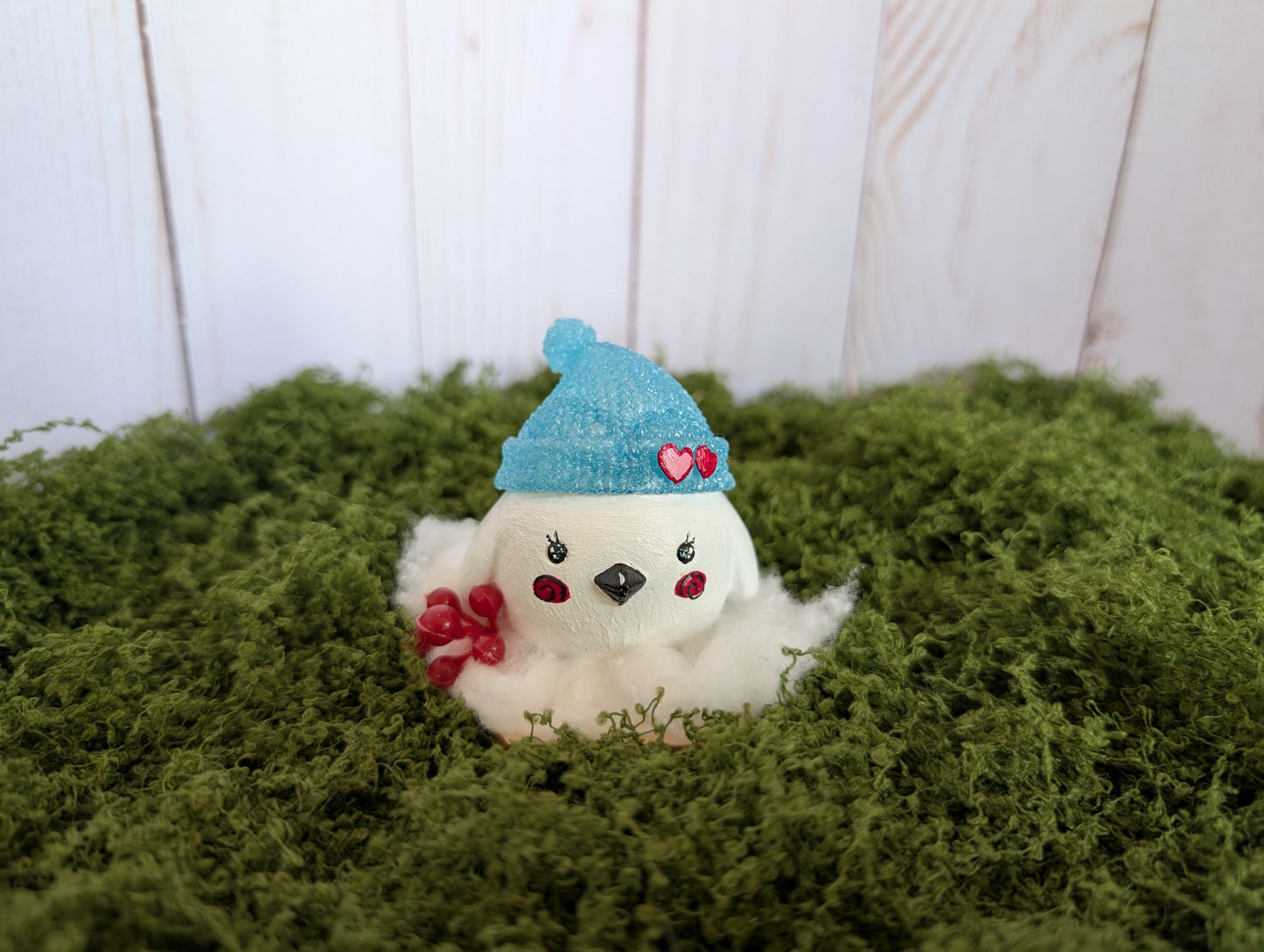 White Lovebird Snow Buddy with Blue Hat