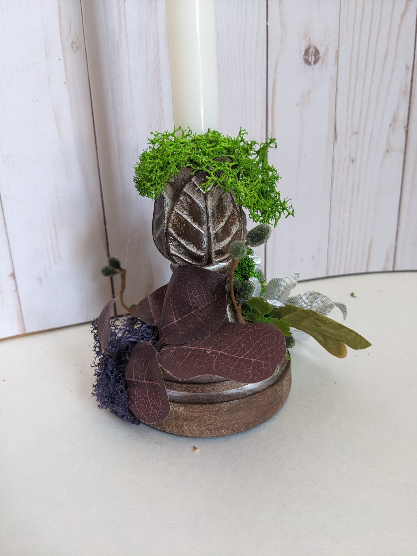 Silver Poinsettia on Wood-look Candlestick