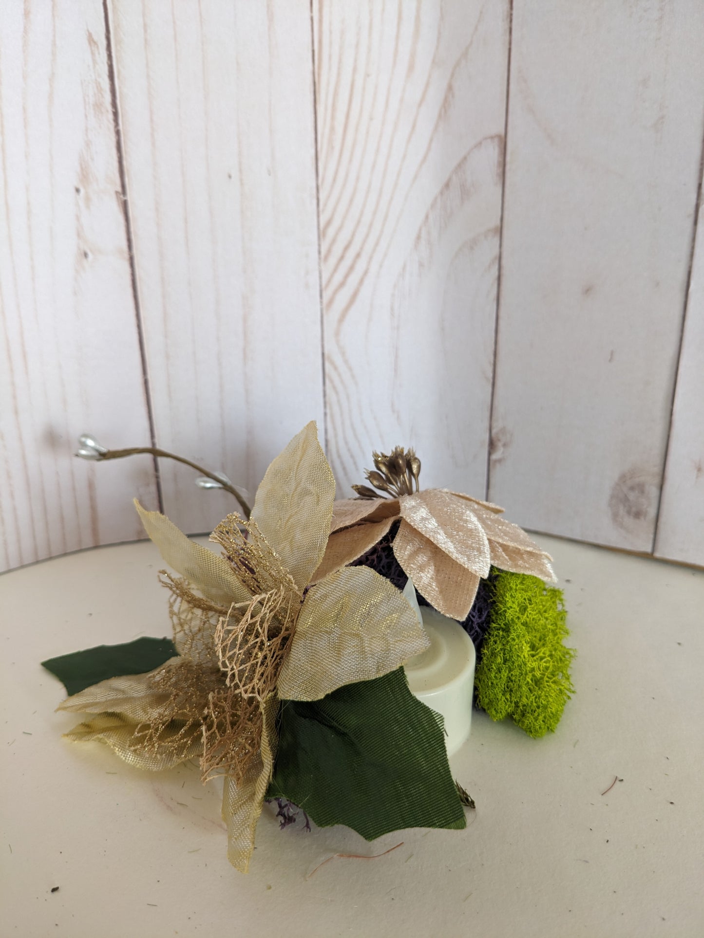 Poinsettias with Candle