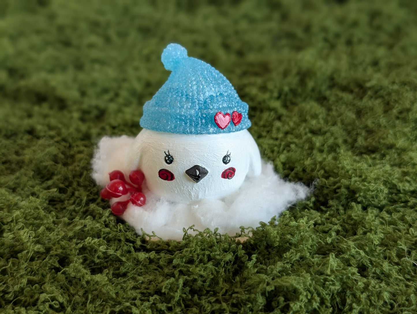 White Lovebird Snow Buddy with Blue Hat