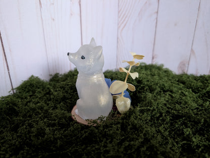 White Puppy with Blue Flower