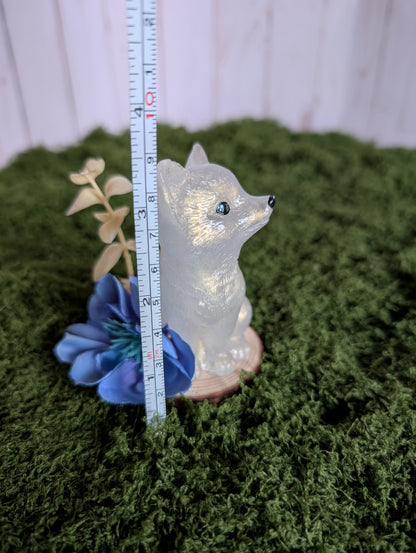 White Puppy with Blue Flower