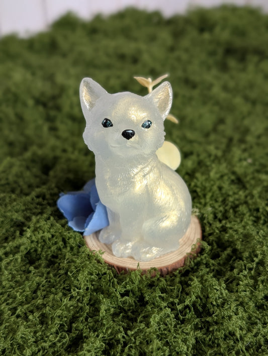 White Puppy with Blue Flower